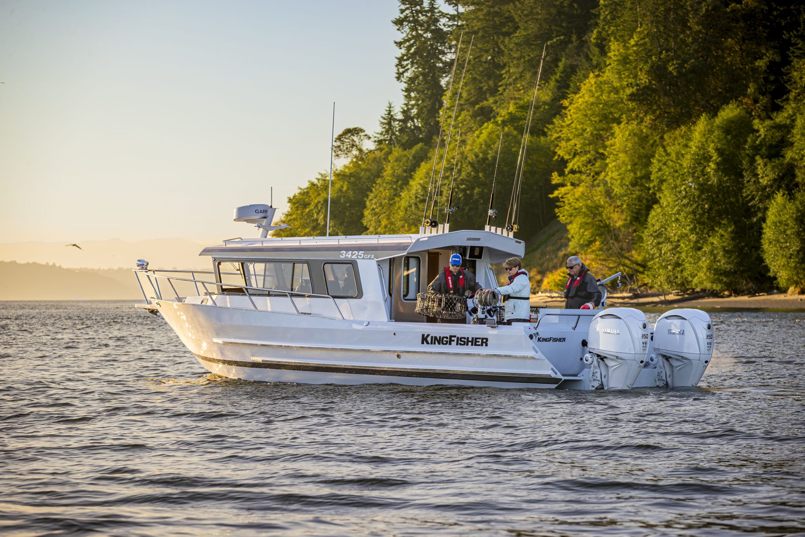 KingFisher 3425 GFX with anglers aboard on calm coastal water